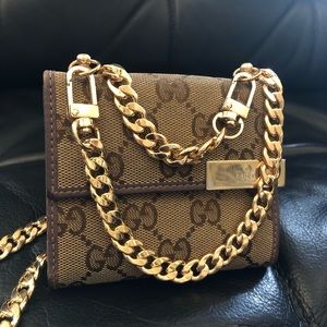 Gucci GG Canvas compact wallet on chain